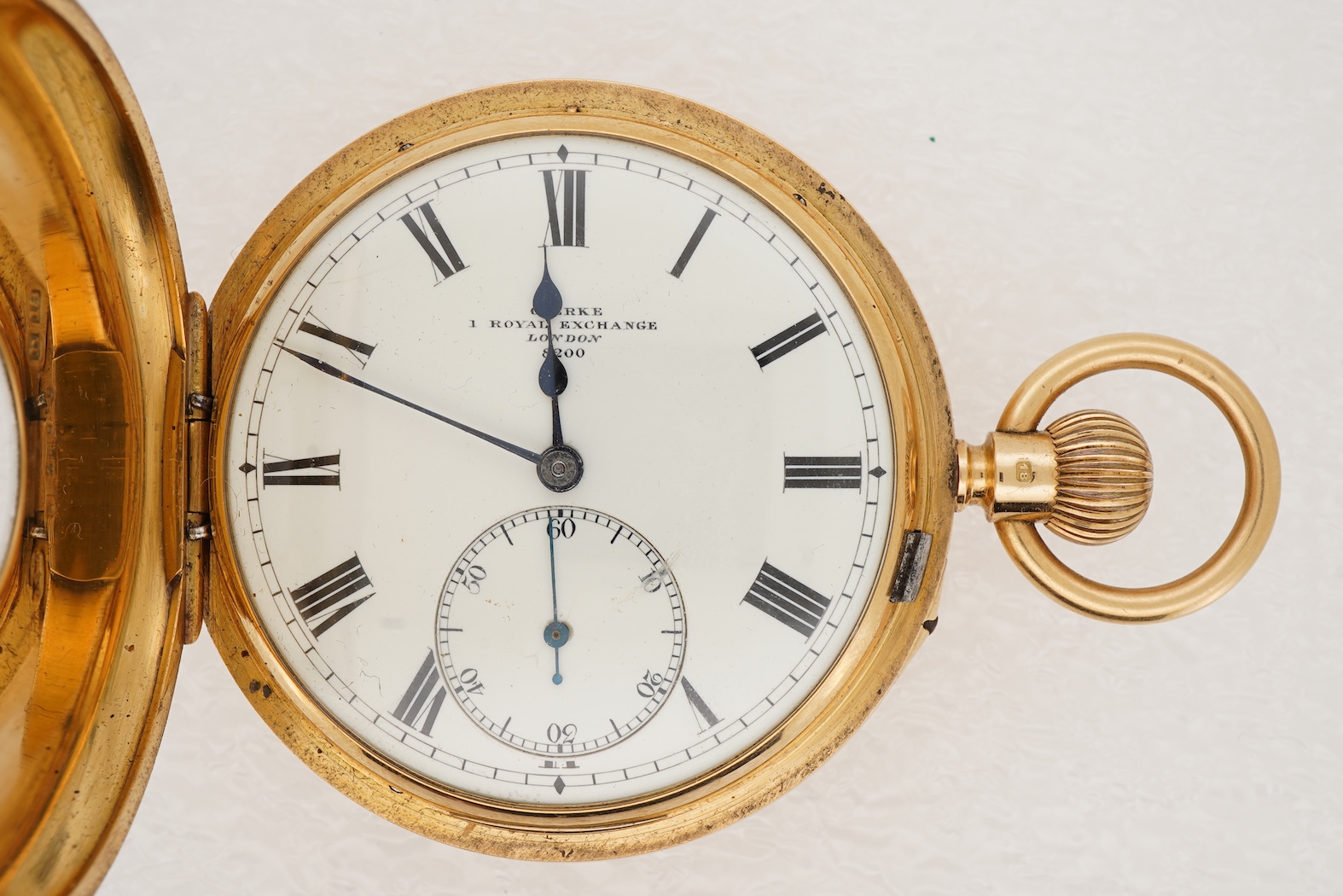 An Edwardian 18ct gold keyless lever half hunter pocket watch, by Clerke, Royal Exchange, London